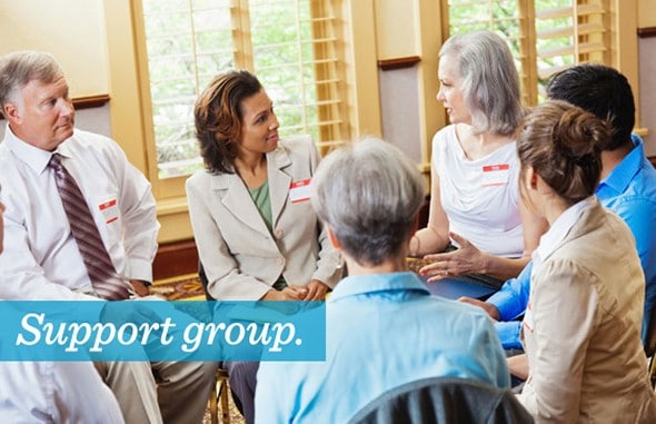 A support group in progress. Text overlay reads support group