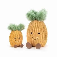Two smiling stuffed pineapples