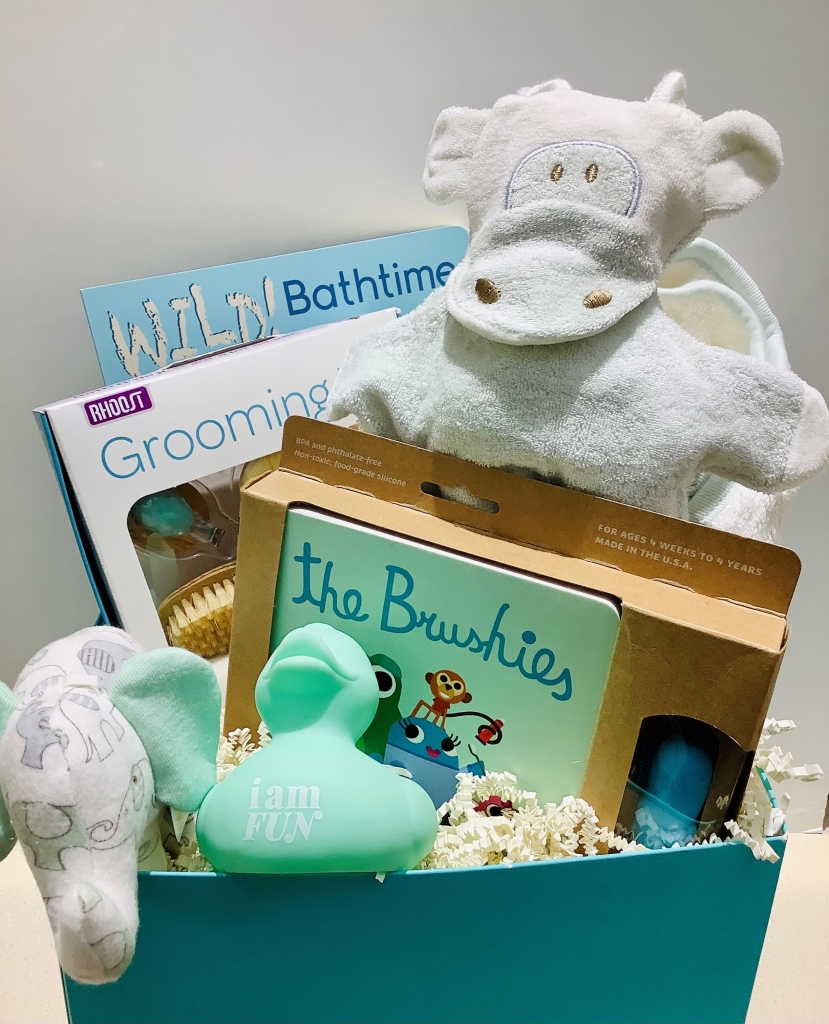 Box filled with small baby bath-based items
