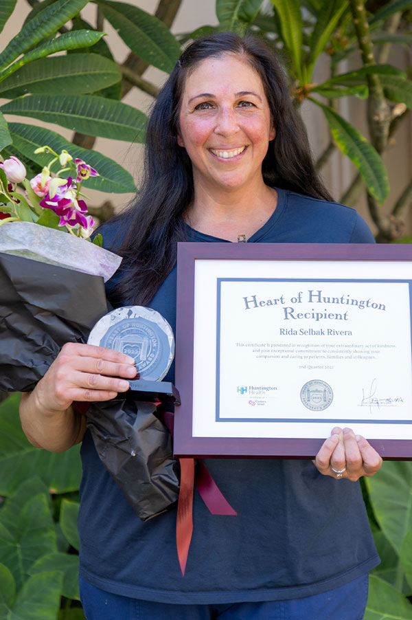 Rida Selbak Rivera with the Heart of Huntington award