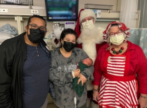 Huntington pediatric and NICU patients receive a special visit from Santa, with a little help from local police departments