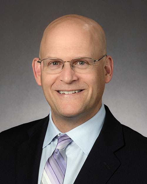 John M. Corman, MD, MBA