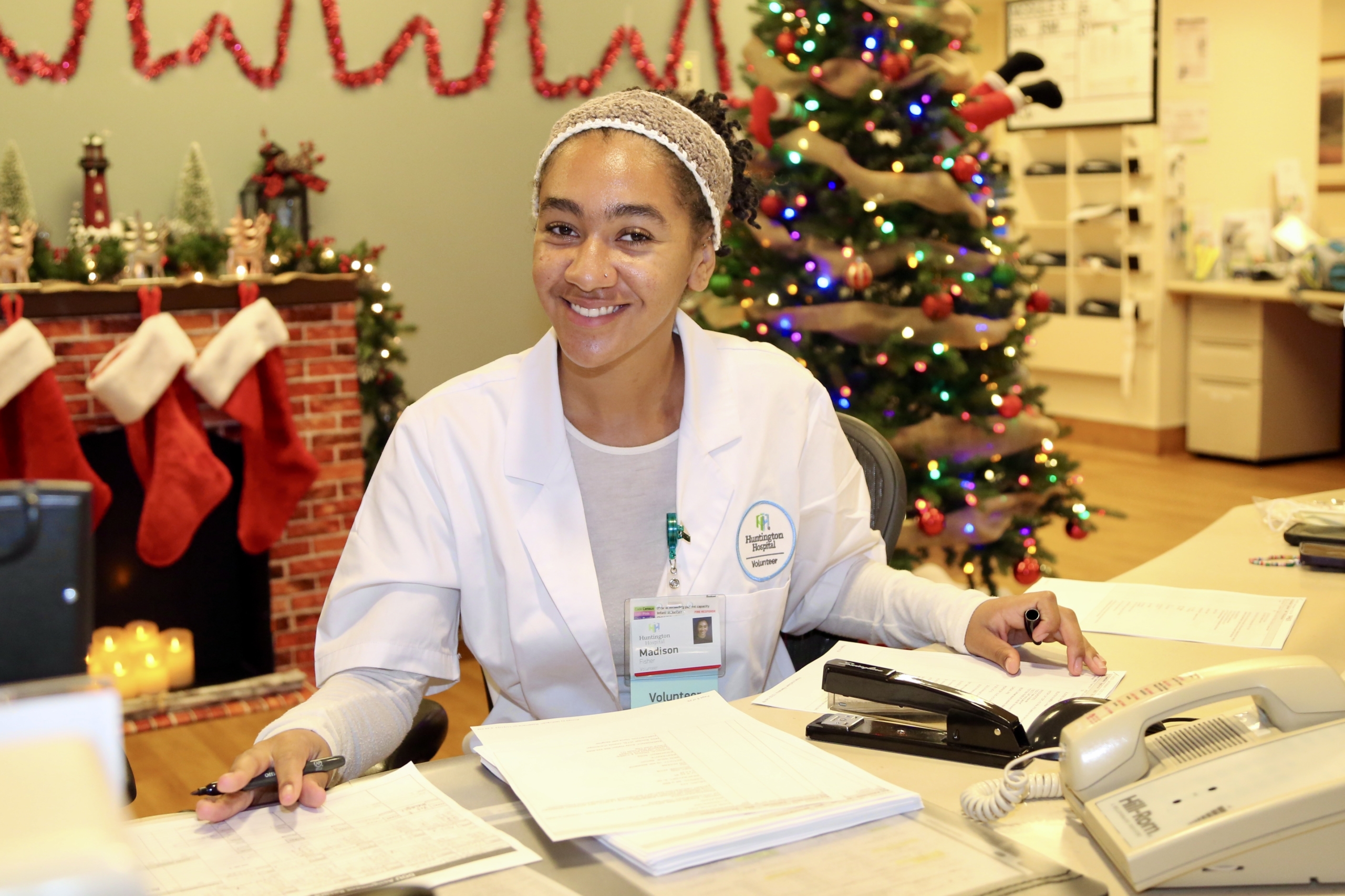 A volunteer at the nursing station.