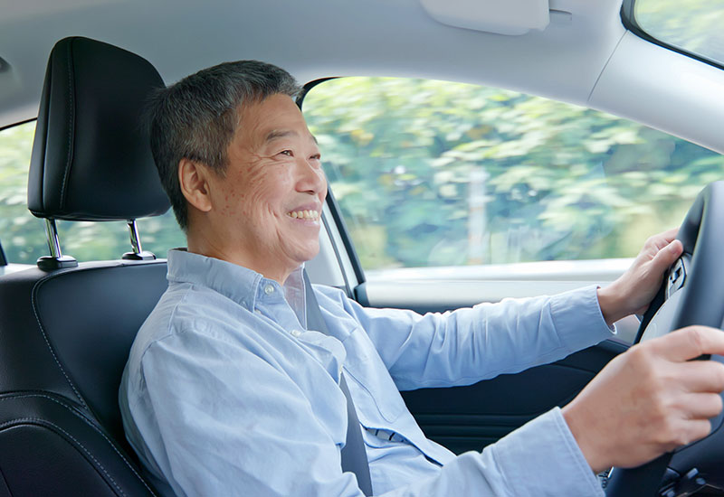 Senior man driving a car