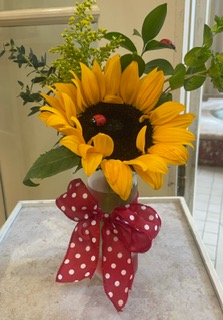 Flower arrangement with a sun flower
