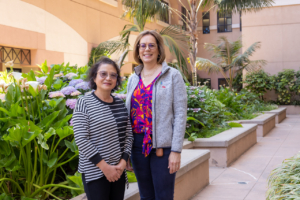 Huntington Senior Care Network director standing outside with a grateful client.