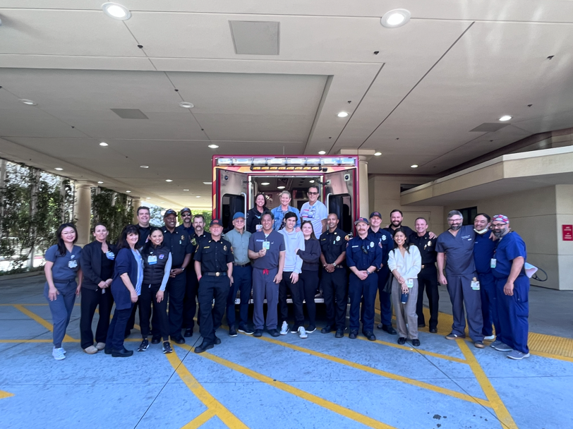 Dr. Roger Yang receives medical director badge from Pasadena Fire Department